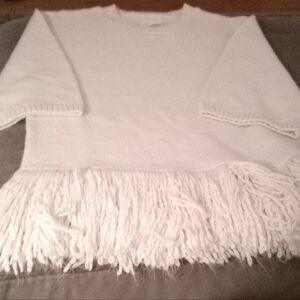 Elegant Cream Fringe Sweater-currently at the store.